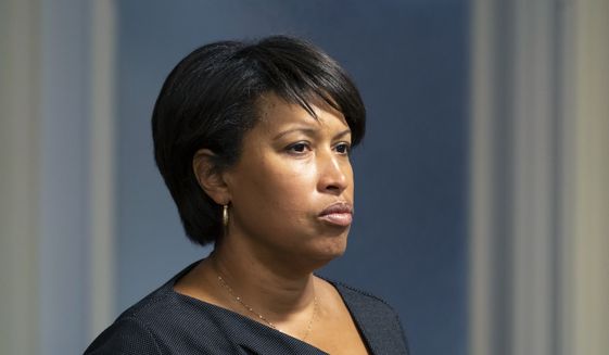 Washington Mayor Muriel Bowser listens to reporters&#39; questions about preparations for the upcoming 2022 State of the Union Address during a news conference, Monday, Feb. 28, 2022, in Washington. (AP Photo/Alex Brandon) ** FILE **