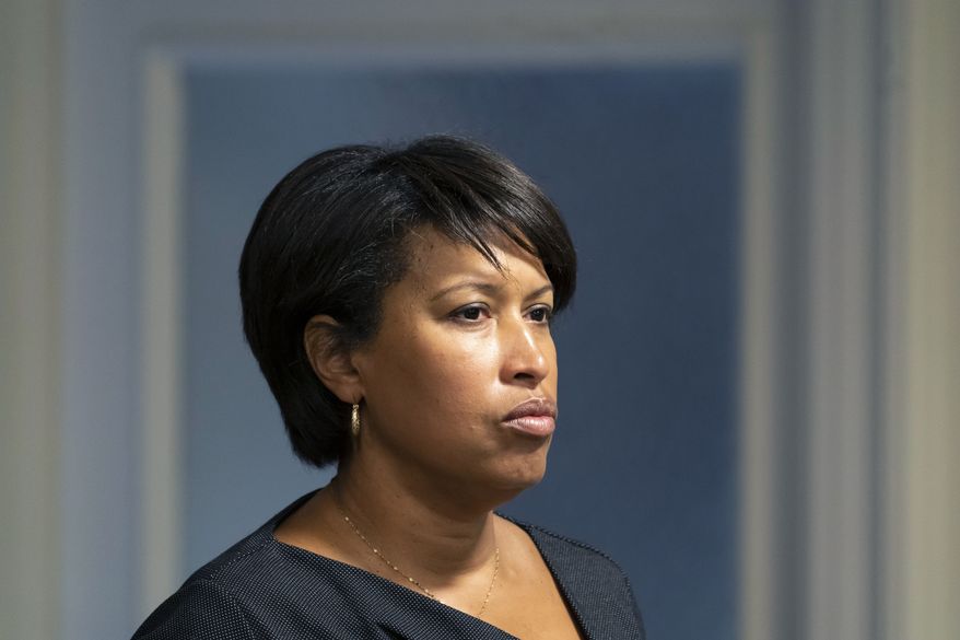 Washington Mayor Muriel Bowser listens to reporters&#x27; questions about preparations for the upcoming 2022 State of the Union Address during a news conference, Monday, Feb. 28, 2022, in Washington. (AP Photo/Alex Brandon) ** FILE **