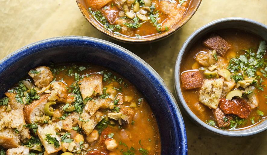 This image released by Milk Street shows a recipe for Chickpea & Harissa Soup. (Milk Street via AP)