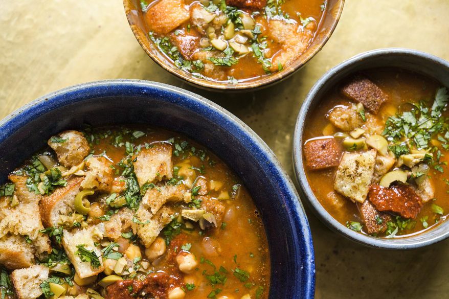 This image released by Milk Street shows a recipe for Chickpea & Harissa Soup. (Milk Street via AP)