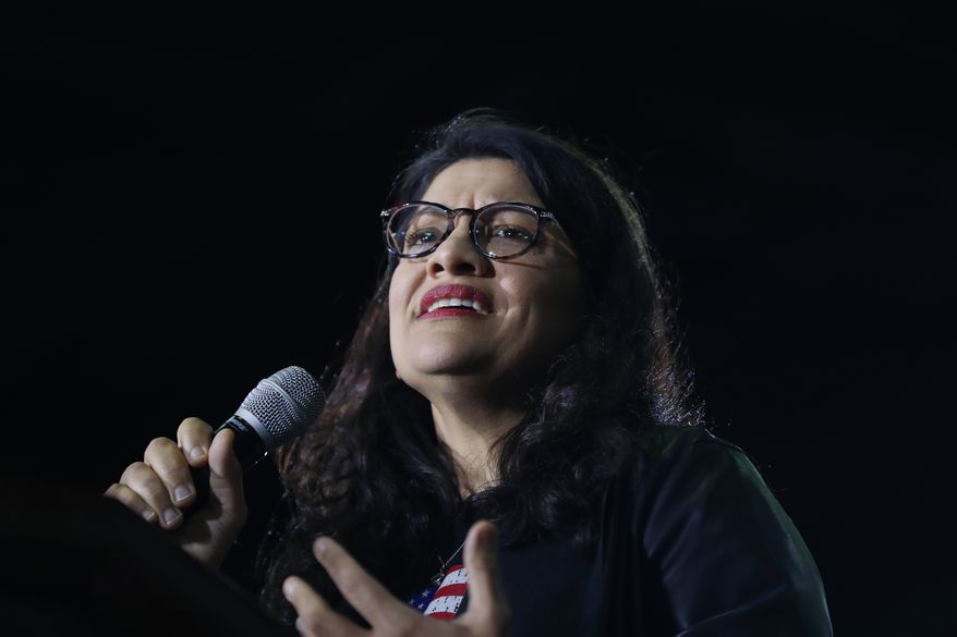 Rep. Rashida Tlaib, Michigan Democrat, is part of “The Squad” in the House, a group of minority lawmakers fighting to push the Democratic Party further to the left on policy. (AP Photo/Paul Sancya, File)