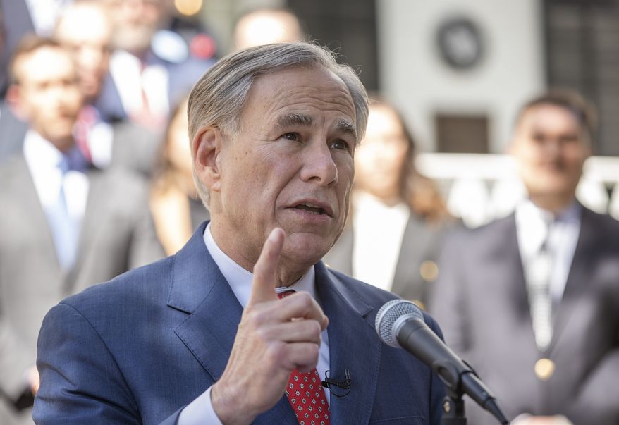 Gov. Greg Abbott speaks arrives at a ceremony at the Governors Mansion on Tuesday March 1, 2022, in Austin, Texas, where Abbott received the Governors Cup from the Site Selection Magazine. Voters in Texas will usher in the midterm campaign season with primaries that will test just how far to the right the Republican Party will shift in a state where many in the GOP have already tightened their embrace of former President Donald Trump. (Jay Janner/Austin American-Statesman via AP)