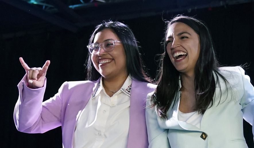 U.S. Rep. Alexandria Ocasio-Cortez, right, attends a rally with Democratic congressional candidate Jessica Cisneros, left, Saturday, Feb. 12, 2022, in San Antonio. Cisneros is challenging nine-term U.S. Rep. Henry Cuellar Texas' first-in-the-nation primary Tuesday, March 1, 2022. (AP Photo/Eric Gay, File)