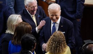 President Joe Biden is greeted by Democrats after delivering his State of the Union address to a joint session of Congress, Tuesday, March 1, 2022, at the Capitol in Washington. (Jabin Botsford, Pool via AP) (Jabin Botsford, Pool via AP)