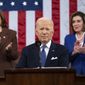 President Joe Biden delivers his first State of the Union address to a joint session of Congress at the Capitol, as Vice President Kamala Harris and House Speaker Nancy Pelosi of Calif., watch, Tuesday, March 1, 2022, in Washington. (Saul Loeb/Pool via AP)