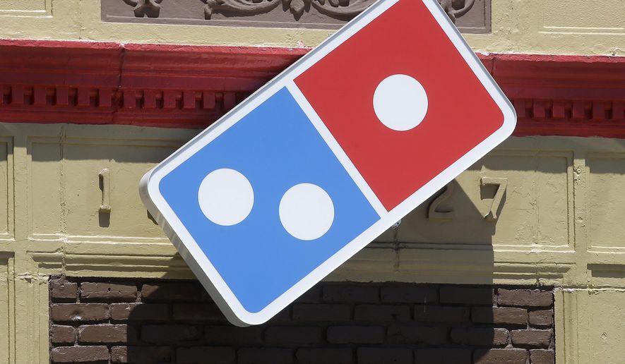 In this July 15, 2019, photo, a Domino&#39;s location in Norwood, Mass., is shown. (AP Photo/Steven Senne) **FILE**