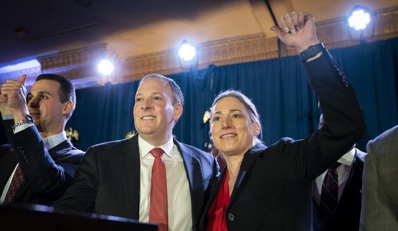 U.S. Rep. Lee Zeldin, left, stands with his lieutenant governor pick Alison Esposito, right, after speaking to delegates and assembled party officials at the 2022 NYGOP Convention, Tuesday, March 1, 2022, in Garden City, N.Y. (AP Photo/John Minchillo) ** FILE **