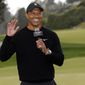 Tiger Woods speaks during the trophy ceremony on the 18th green after the Genesis Invitational golf tournament at Riviera Country Club, Sunday, Feb. 20, 2022, in the Pacific Palisades area of Los Angeles. (AP Photo/Ryan Kang) **FILE**