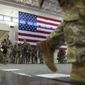 Over 180 soldiers with the U.S. Army 3rd Infantry Division, 1st Armored Brigade Combat Team prepare to board a charter flight during their deployment to Germany from Hunter Army Airfield, Wednesday March 2, 2022 in Savannah, Ga. The division is sending 3,800 troops as reinforcements for various NATO allies in Eastern Europe. (Stephen B. Morton /Atlanta Journal-Constitution via AP)