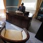 Virginia Gov. Glenn Youngkin works in the old Governor&#39;s office at the Capitol Wednesday March 2, 2022, in Richmond, Va. (AP Photo/Steve Helber)