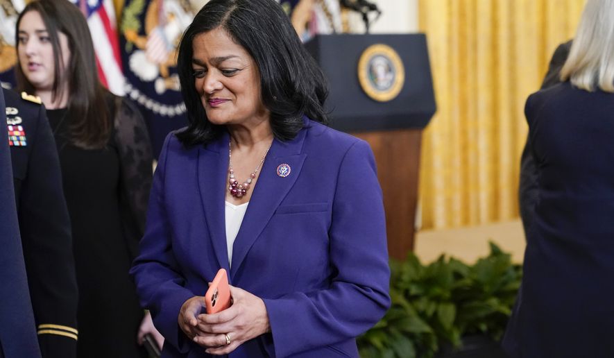 Rep. Pramila Jayapal, D-Wash., arrives in the East Room of the White House in Washington, D.C., in this March 3, 2022, file photo. Progressives lawmakers like Ms. Jayapal say a budget bill before the House should not move forward if it penalizes states that have used federal coronavirus funds equally with those that have not. (AP Photo/Patrick Semansky)  **FILE**
