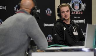IMAGE DISTRIBUTED FOR SIRIUSXM -  From left, Bruce Gradkowski and Kenny Pickett on SiriusXM NFL Radio at the NFL Scouting Combine on Wednesday, March 2, 2022 in Indianapolis. (Steve Luciano/AP Images for SiriusXM)