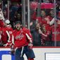 Washington Capitals left wing Alex Ovechkin (8) celebrates his goal during the second period of an NHL hockey game against the Carolina Hurricanes, Thursday, March 3, 2022, in Washington. (AP Photo/Evan Vucci)