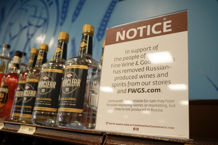 FILE - A sign in the vodka area of a Pennsylvania Fine Wine and Good Spirits store reflects the state's decision to withdraw Russian-made products for sale, Monday, Feb. 28, 2022, in Harmony, Pa. (AP Photo/Keith Srakocic, File)
