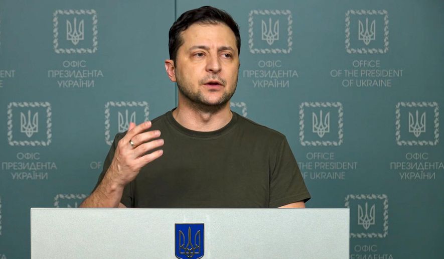 In this photo, Feb. 27, 2022, taken from video provided by the Ukrainian Presidential Press Office, Ukrainian President Volodymyr Zelenskyy speaks to the nation in Kyiv, Ukraine.  Russian state media is spreading false claims that Ukrainian President Volodymyr Zelenskyy has fled Kyiv in what experts say is an effort to discourage Ukrainians and erode support for Ukraine around the globe.  (Ukrainian Presidential Press Office via AP, File)