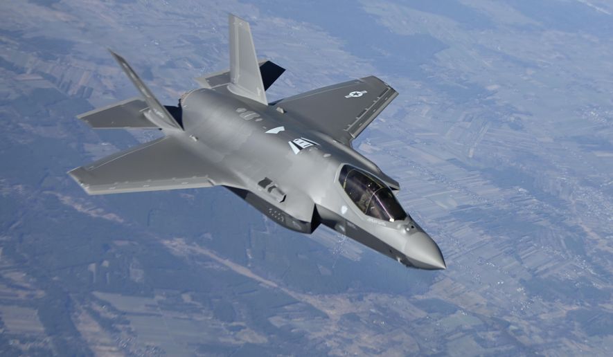 In this image provided by the U.S. Air Force, a U.S. Air Force F-35 Lightning II aircraft assigned to the 34th Fighter Squadron, departs from a KC-10 Extender aircraft after receiving fuel over Poland, on Feb. 24, 2022, as it flies in support of North Atlantic Treaty Organization enhanced air policing missions. Russia&#39;s attack on Ukraine&#39;s Zaporizhzhia nuclear power plant has renewed calls for NATO to impose a no-fly zone over Ukraine, despite the repeated rejection of the idea by western leaders concerned about triggering a wider war in Europe. (Senior Airman Joseph Barron/U.S. Air Force via AP)