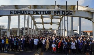 Vice President Kamala Harris marches on the Edmund Pettus Bridge after speaking in Selma, Ala., on the anniversary of &quot;Bloody Sunday,&quot; a landmark event of the civil rights movement, Sunday, March 6, 2022. (AP Photo/Brynn Anderson)
