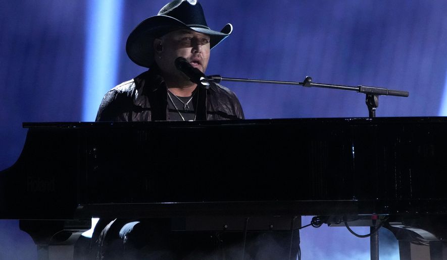 Jason Aldean performs &#39;If I Didn&#39;t Love You&#39; at the 57th Academy of Country Music Awards on Monday, March 7, 2022, at Allegiant Stadium in Las Vegas. (AP Photo/John Locher)