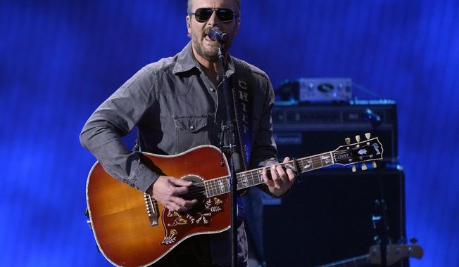 Eric Church performs a medley at the 57th Academy of Country Music Awards on Monday, March 7, 2022, at Allegiant Stadium in Las Vegas. (AP Photo/John Locher)