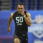 Maryland defensive back Nick Cross runs the 40-yard dash at the NFL football scouting combine, Sunday, March 6, 2022, in Indianapolis. (AP Photo/Charlie Neibergall)