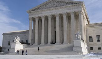 Tourists visit the Supreme Court, Jan., 2022, in Washington, in this file photo. (AP Photo/Jacquelyn Martin, file)  **FILE**
