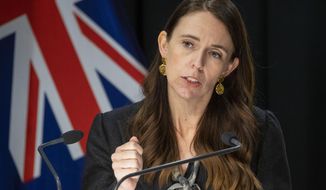 New Zealand Prime Minister Jacinda Ardern gestures during the post-Cabinet press conference in Wellington, New Zealand, Monday, March 7, 2022. New Zealand&#39;s government plans to rush through a new law this week that will enable it to impose economic sanctions on Russia over its invasion of Ukraine. (Mark Mitchell/Pool Photo via AP)