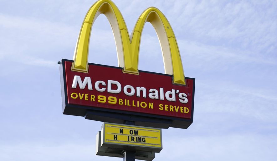 A sign is displayed outside a McDonald&#39;s restaurant, Tuesday, April 27, 2021, in Des Moines, Iowa. McDonald’s said Tuesday, March 8, 2022,  it is temporarily closing all of its 850 restaurants in Russia in response to the country&#39;s invasion of Ukraine. The burger giant said it will continue paying its 62,000 employees in Russia. (AP Photo/Charlie Neibergall, File)