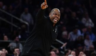 Georgetown head coach Patrick Ewing calls out to his team after a shot clock violation during the first half of an NCAA college basketball game against Seton Hall at the Big East men&#39;s tournament Wednesday, March 9, 2022, in New York. (AP Photo/Frank Franklin II)