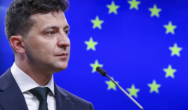 FILE - Ukrainian President Volodymyr Zelenskyy speaks during a media conference at the Europa building in Brussels, June 5, 2019. Russia lost influence and friends since the collapse of the Soviet empire in 1989. But the nuclear superpower still holds sway over several of its neighbors in Europe and keeps others in an uneasy neutrality. The Russian invasion of neighboring Ukraine and the humanitarian tragedy it provoked over the past two weeks may have raised an Western outcry of heartfelt support. (AP Photo/Riccardo Pareggiani, File)