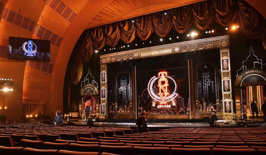 FILE - A decorated stage appears prior to the 73rd annual Tony Awards at Radio City Music Hall in New York on June 9, 2019. The Broadway League and the American Theatre Wing announced Wednesday that the Tony Awards will be held at Radio City Music Hall on June 12 and aired on CBS. Instead of a three-hour presentation, producers are adding an extra hour ahead of the telecast that will stream only on Paramount+. (Photo by Charles Sykes/Invision/AP, File)