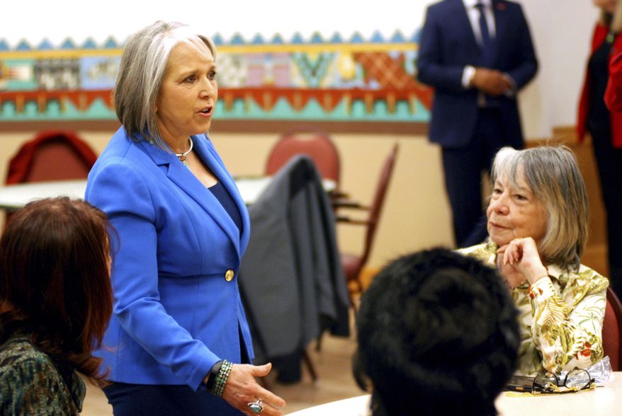 New Mexico Gov. Michelle Lujan Grisham talks with an audience at a retirement center in Santa Fe, N.M., on Tuesday, March 8, 2022. (AP Photo/Morgan Lee) ** FILE **
