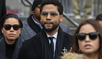 Former &quot;Empire&quot; actor Jussie Smollett leaves the Leighton Criminal Courthouse in Chicago, Monday Feb. 24, 2020. Smollett is returning to a Chicago courtroom Thursday, March 10, 2022 for sentencing with just two questions hanging over his head: Will he admit that he lied about a racist homophobic attack and will a judge send him to jail? (AP Photo/Matt Marton File)