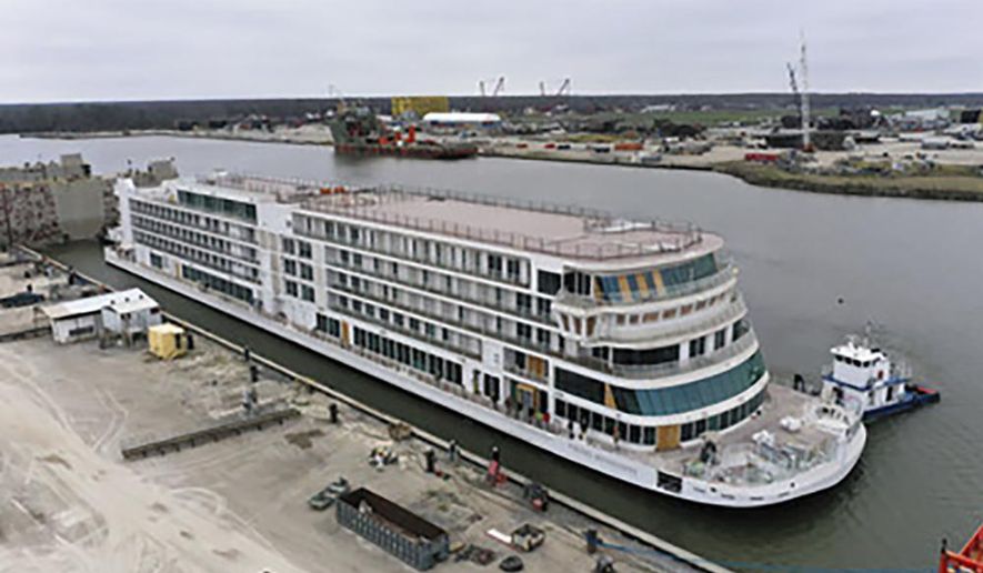 This photo provided by Viking shows the Viking Mississippi at Edison Chouest Offshore&#39;s LaShip shipyard in Houma, La., on March 7, 2022.  The Swiss company’s cruises along the length of the Mississippi River are a step closer to reality — its new 386-passenger ship has touched water for the first time. Viking River Cruises of Basel, which announced plans for Mississippi River cruises in 2015, celebrated the “float out” of the Viking Mississippi on Monday, March 7, at Edison Chouest Offshore’s LaShip shipyard in Houma. (Viking via AP)