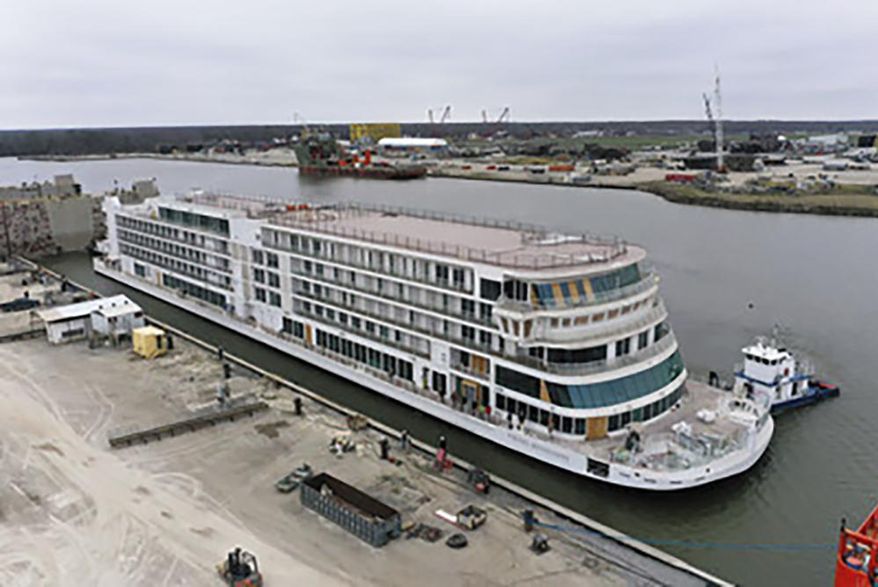 This photo provided by Viking shows the Viking Mississippi at Edison Chouest Offshore&#39;s LaShip shipyard in Houma, La., on March 7, 2022.  The Swiss company’s cruises along the length of the Mississippi River are a step closer to reality — its new 386-passenger ship has touched water for the first time. Viking River Cruises of Basel, which announced plans for Mississippi River cruises in 2015, celebrated the “float out” of the Viking Mississippi on Monday, March 7, at Edison Chouest Offshore’s LaShip shipyard in Houma. (Viking via AP)