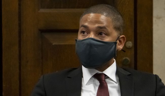 Actor Jussie Smollett tears up after listening to his brother testify at his sentencing hearing at the Leighton Criminal Court Building, Thursday, March 10, 2022, in Chicago. (Brian Cassella/Chicago Tribune via AP, Pool)