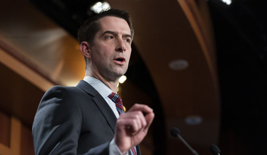 Sen. Tom Cotton, R-Ark., speaks with reporters about aid to Ukraine, on Capitol Hill, Wednesday, March 10, 2022, in Washington. (AP Photo/Alex Brandon)