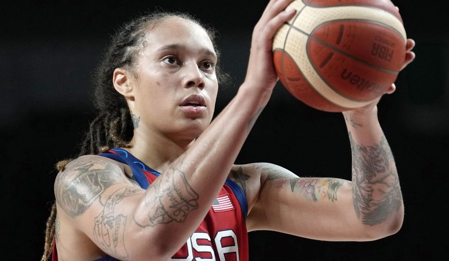 United States&#39; Brittney Griner (15) shoots during a preliminary round women&#39;s basketball game against Nigeria at the 2020 Summer Olympics, on July 27, 2021, in Saitama, Japan. Griner’s detention in Russia raises all sorts of questions. Is she a political prisoner in the standoff between two superpowers? Is she being treated like anyone else who violated the law in a foreign country? (AP Photo/Eric Gay, File)