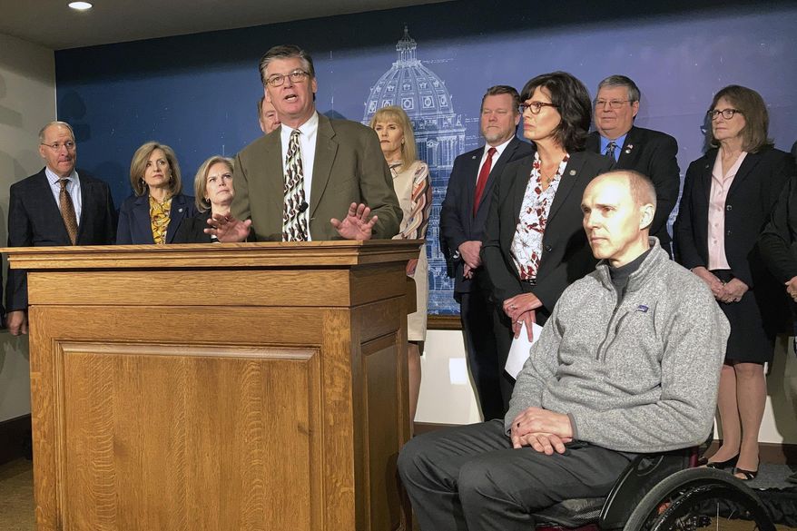 Republican state Sen. Eric Pratt speaks at a news conference at the Minnesota State Capitol about a looming increase in unemployment insurance taxes on employers, Thursday, March 10, 2022 in St. Paul, Minn. (AP Photo/Steve Karnowski)