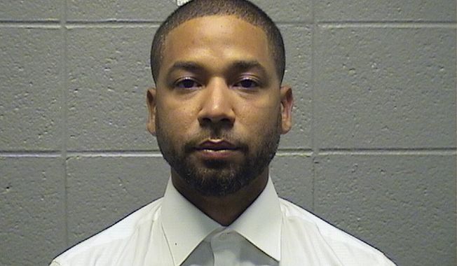 This booking photo provided by the Cook County Sheriff&#x27;s Office shows Jussie Smollett. A judge sentenced Jussie Smollett to 150 days in jail Thursday, March 10, 2022, branding the Black and gay actor a charlatan for staging a hate crime against himself while the nation struggled with wrenching issues of racial injustice. (Cook County Sheriff&#x27;s Office via AP)
