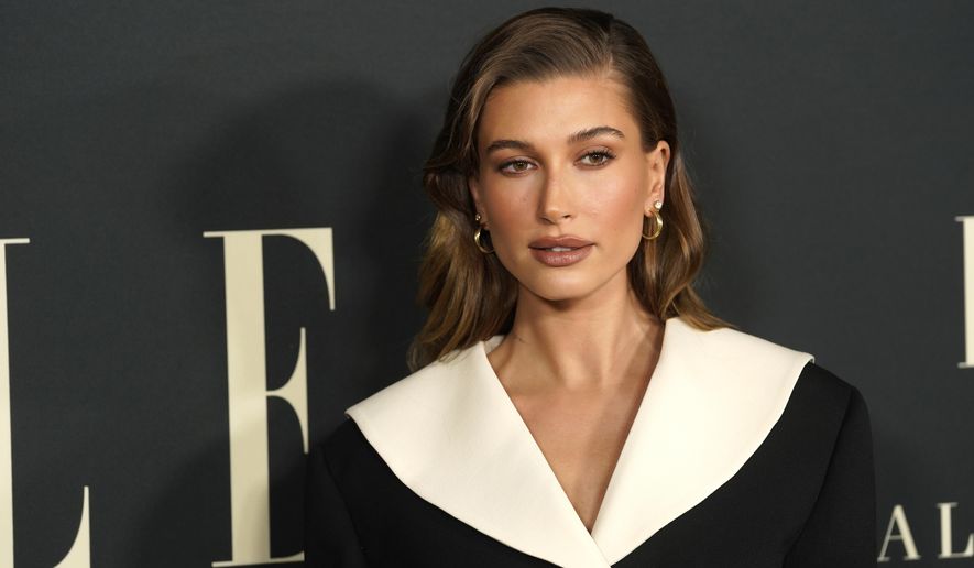 Hailey Bieber arrives at the 27th annual ELLE Women in Hollywood celebration on Tuesday, Oct. 19, 2021, at the Academy Museum of Motion Pictures in Los Angeles. The model says on Saturday, March 12, 2022, that she&#39;s fine after a health scare, suffering a small blood clot to her brain. Bieber, wife of pop star Justin Bieber, posted on Instagram Saturday that she was having breakfast with her husband on Thursday when she began feeling stroke-like symptoms. (AP Photo/Chris Pizzello, File)