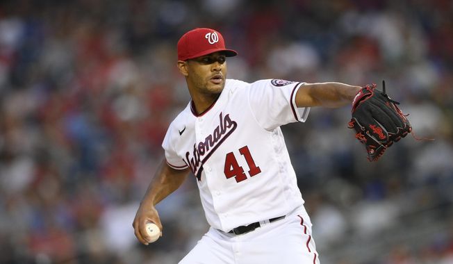 Washington Nationals starting pitcher Joe Ross delivers a pitch during a baseball game against the Chicago Cubs, Saturday, July 31, 2021, in Washington. Ross had an operation recently and is going to be sidelined for about six to eight weeks. (AP Photo/Nick Wass)