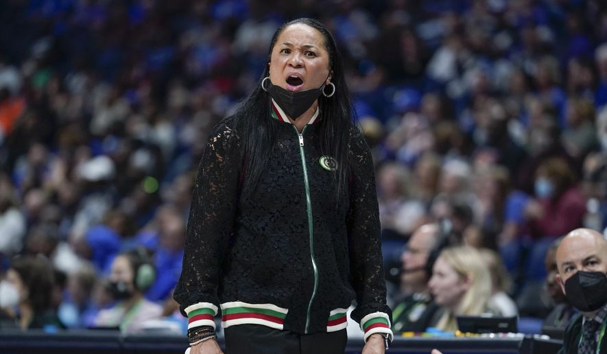 South Carolina head coach Dawn Staley watches the action during her team&#39;s loss to Kentucky in the NCAA women&#39;s college basketball Southeastern Conference tournament championship game Sunday, March 6, 2022, in Nashville, Tenn. (AP Photo/Mark Humphrey) **FILE**