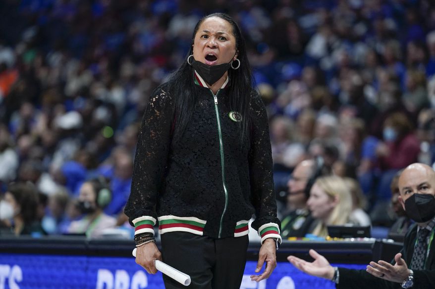 South Carolina head coach Dawn Staley watches the action during her team&#39;s loss to Kentucky in the NCAA women&#39;s college basketball Southeastern Conference tournament championship game Sunday, March 6, 2022, in Nashville, Tenn. (AP Photo/Mark Humphrey) **FILE**