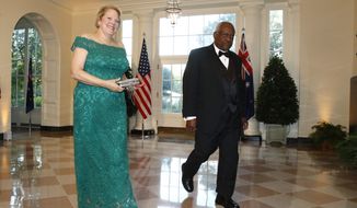 Supreme Court Associate Justice Clarence Thomas, right, and wife Virginia &quot;Ginni&quot; Thomas arrive for a State Dinner with Australian Prime Minister Scott Morrison and President Donald Trump at the White House in Washington. (AP Photo/Patrick Semansky, File)
