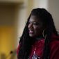 Rep. Cori Bush, D-Mo., speaks with students at Sumner High School Monday, March 14, 2022, in St. Louis. (AP Photo/Jeff Roberson)