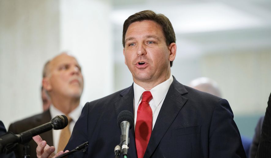 Florida Gov. Ron DeSantis responds to questions from the media at the close of the legislative session on Monday, March 14, 2022. (Alicia Devine/Tallahassee Democrat via AP)