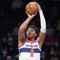 Washington Wizards forward Rui Hachimura (8) shoots for three points in the first half of an NBA basketball game against the Brooklyn Nets, Thursday, Feb. 17, 2022, in New York. (AP Photo/John Minchillo) **FILE**