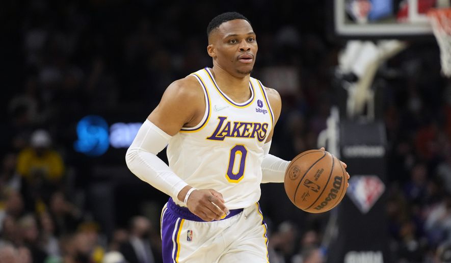 Los Angeles Lakers guard Russell Westbrook (0) during the first half of an NBA basketball game against the Phoenix Suns, Sunday, Jan. 13, 2022, in Phoenix. (AP Photo/Rick Scuteri) **FILE**