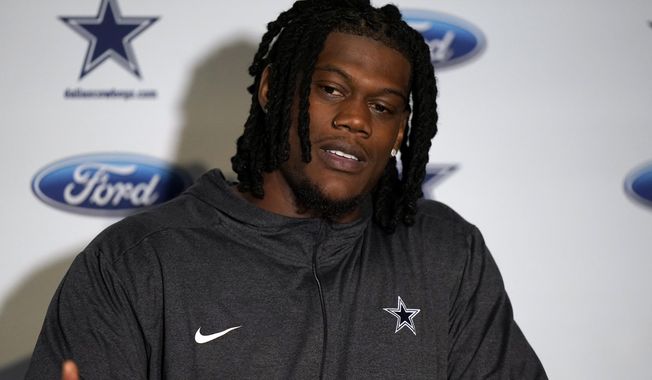 FILE - Dallas Cowboys defensive end Randy Gregory faces reporters following an NFL football game against the New England Patriots, Sunday, Oct. 17, 2021, in Foxborough, Mass. The Denver Broncos and defensive end Randy Gregory have agreed on a $70 million, five-year contract that will prevent the Dallas Cowboys from keeping one of their top targets in free agency, a person with knowledge of the deal said Tuesday, March 15, 2022. (AP Photo/Steven Senne, File)