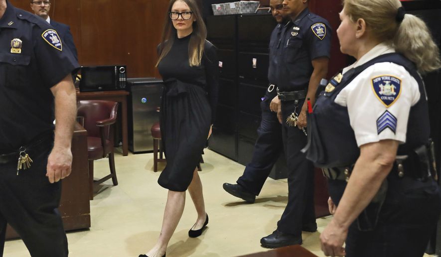 Anna Sorokin arrives for sentencing at New York State Supreme Court, in New York, May 9, 2019. Sorokin, the convicted swindler who claimed to be a German heiress to finance a posh lifestyle in New York, is making a new bid to fight deportation, her lawyer said Tuesday, March 15, 2022. (AP Photo/Richard Drew, File)